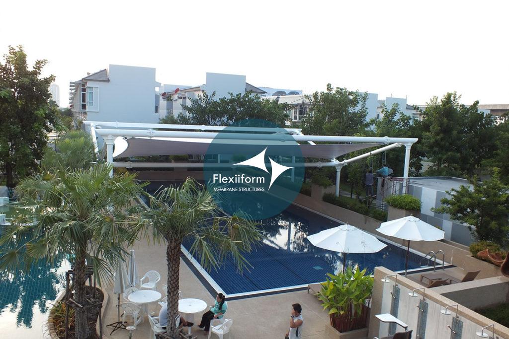 Kiến trúc mái che bể bơi Property Perfect với thiết kế dạng vỏ sò lượn sóng.
